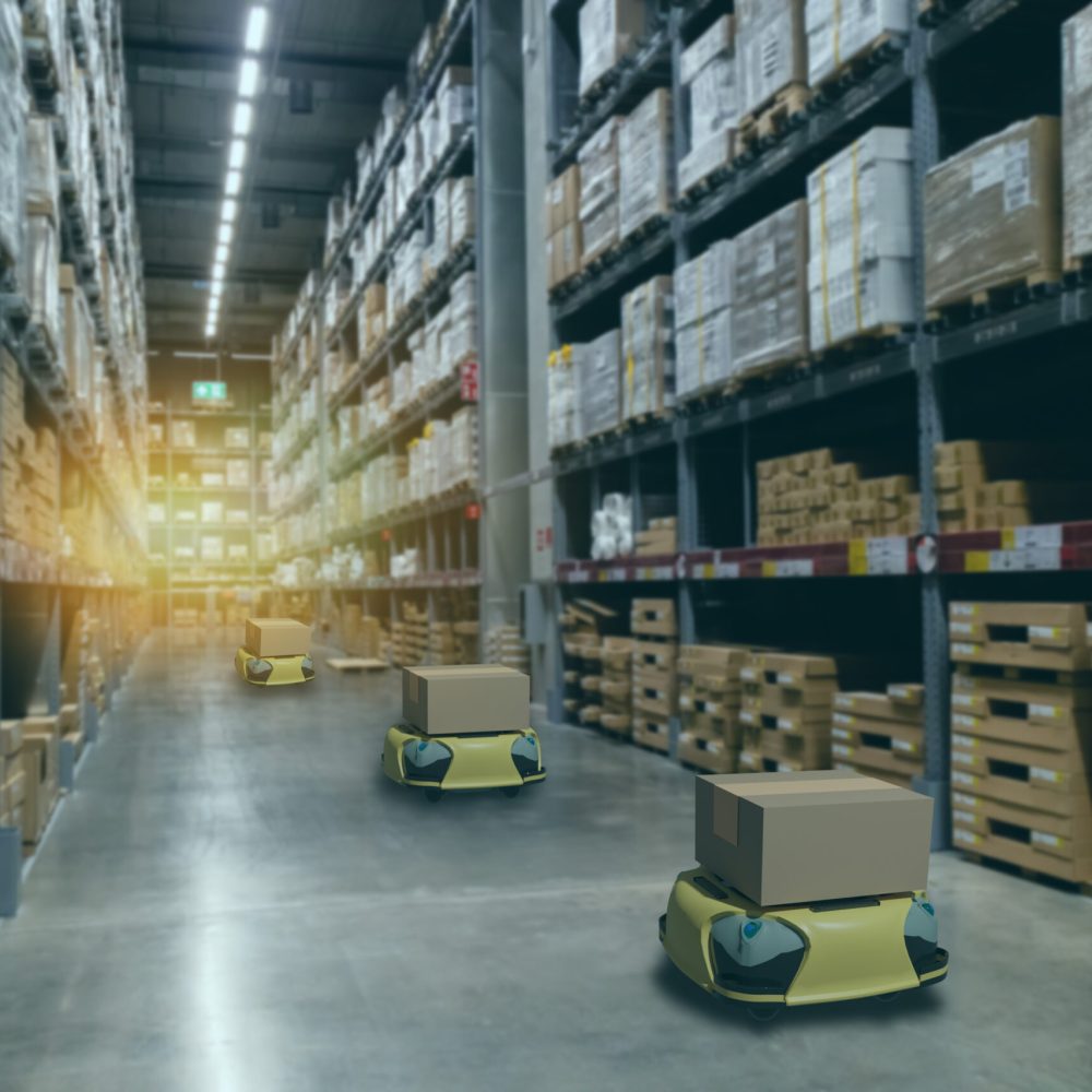Automatiserade robotar i modern logistikhall Automatiserade robotar transporterar varor i modern logistikhall i Stockholm – Hallkonsulten